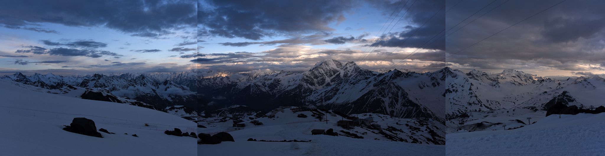 05A Panoramic View Of Garabashi Camp 3730m At Sunset With Mounts Kavkaza, Donguz-Orun, Cheget, Shdavleri On Mount Elbrus Climb